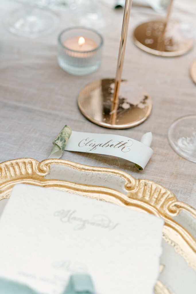 Close up of a place setting that says Elizabeth, Abbazia San Pietro in Valle wedding, image taken by Kelley Williams a wedding photographer in Umbria Italy