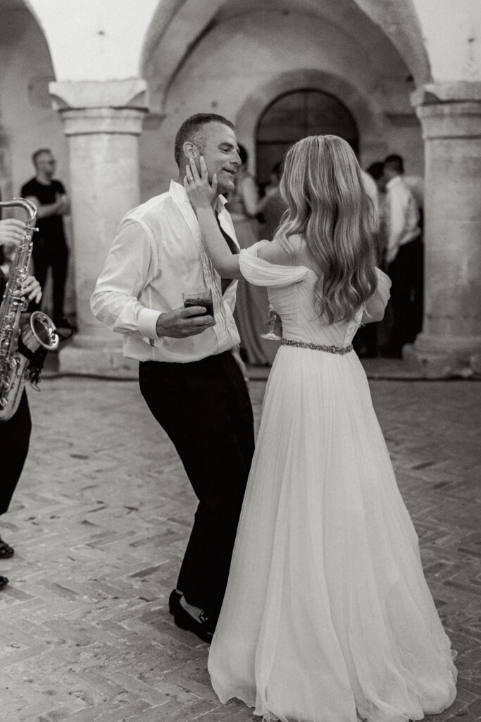 The bride and groom dancing, Abbazia San Pietro in Valle wedding, image taken by Kelley Williams a wedding photographer in Umbria Italy
