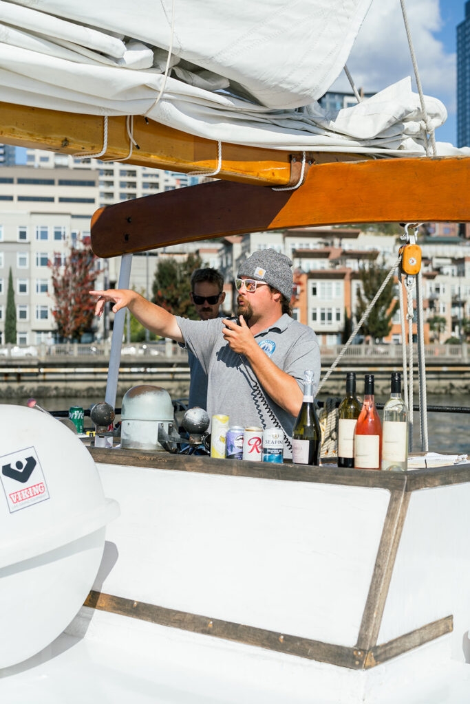 seattle wedding photographer. Sailboat wedding welcome party. washington wedding photographer.